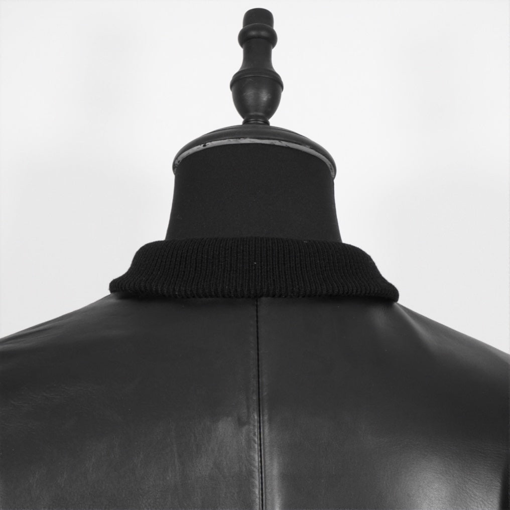 <transcy>BOMBER</transcy>