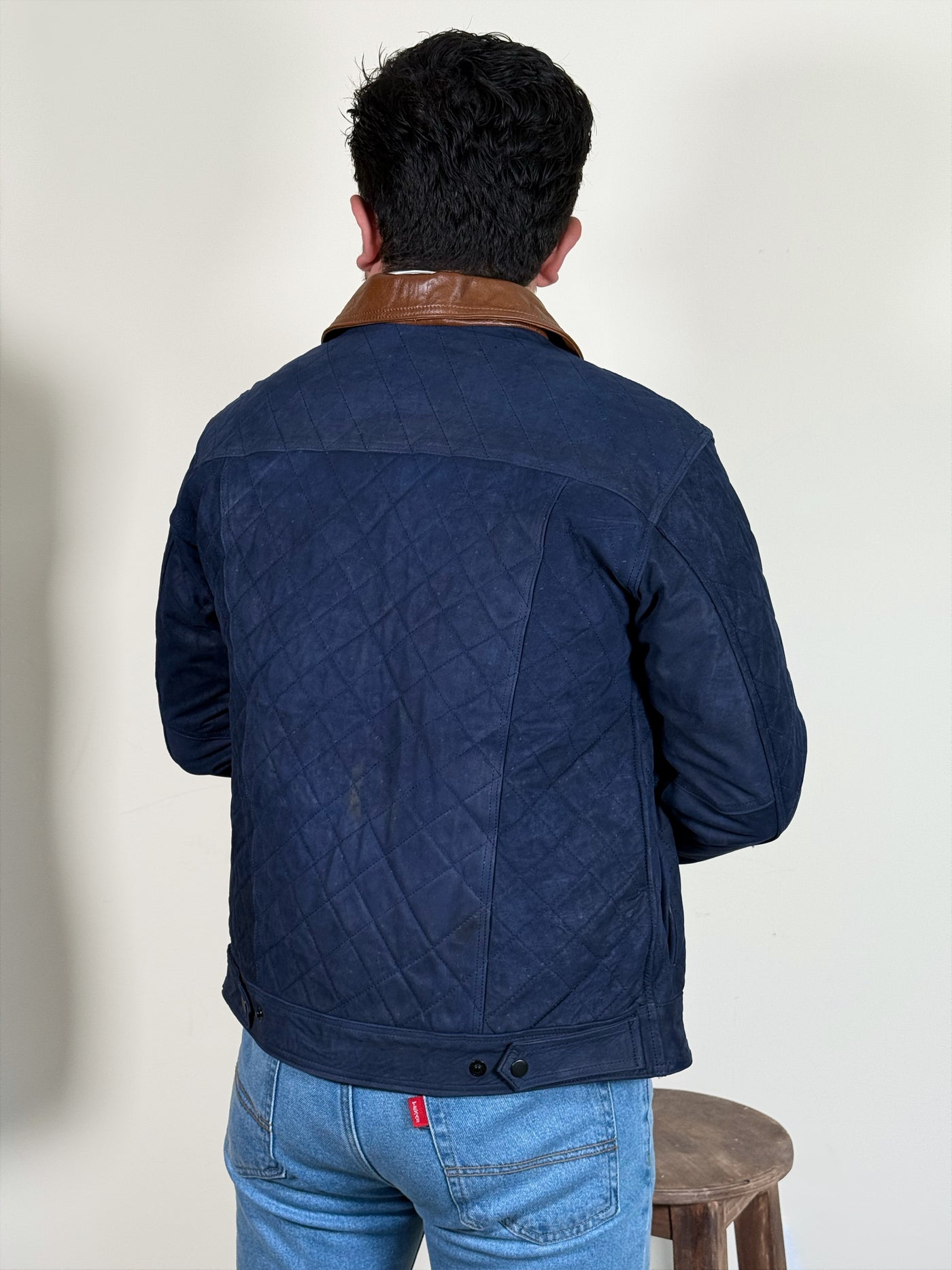 Truker capitonado azul marino