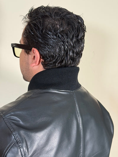 <transcy>BOMBER</transcy>