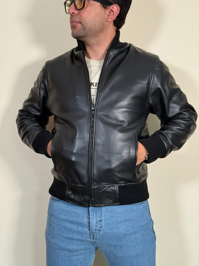<transcy>BOMBER</transcy>