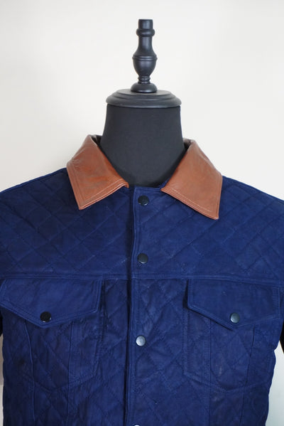 Truker capitonado azul marino